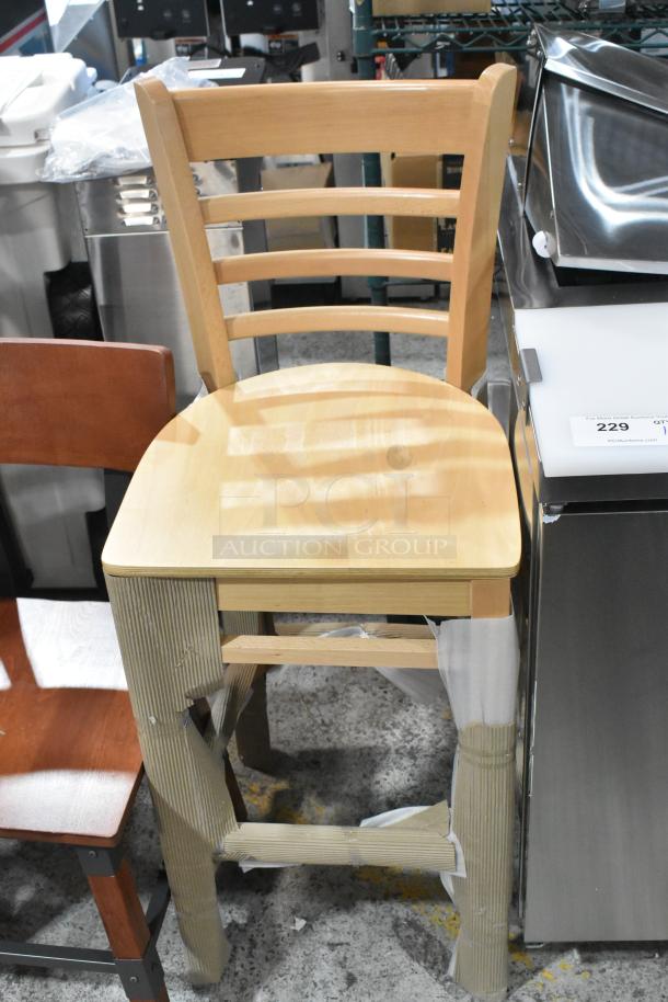 Brand new scratch and dent wooden bar-height chair. Light wood finish, minor packaging wear. Includes dining height version.