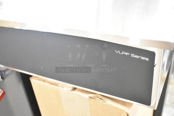 Bunn 07400.0005 VLPF coffee brewer, two warmers, hot water dispenser, poly brew basket, slight scratch, brand new.