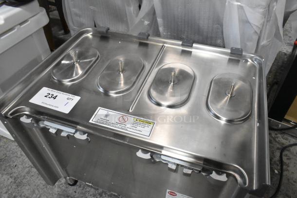 Crathco CS-2D/3D/4E-16 stainless steel beverage machine base, new condition, 120V, 1 phase. Visible labels and caution tag.