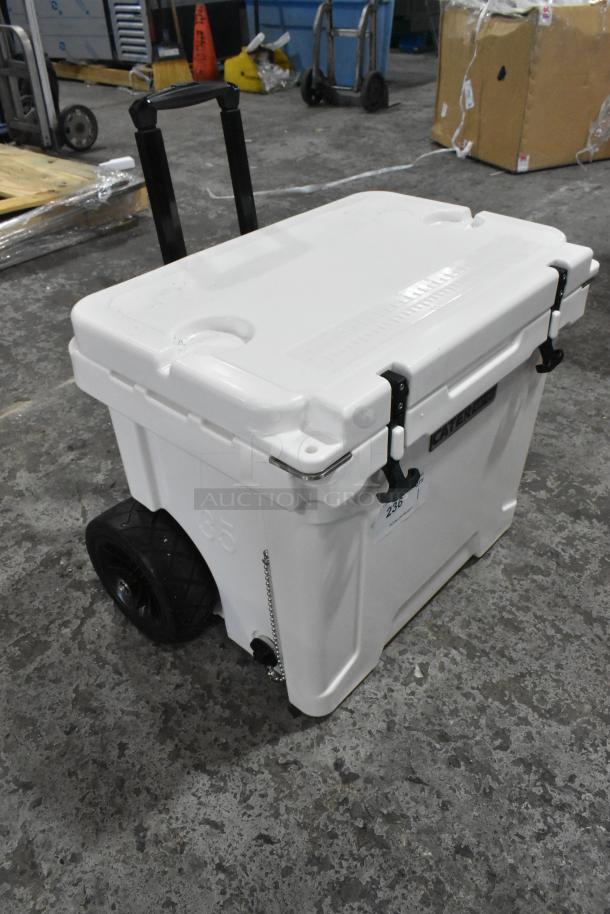 BRAND NEW! CaterGator CG35WHW White 35 Qt. Mobile Rotomolded Cooler with wheels, showing minor scratches.