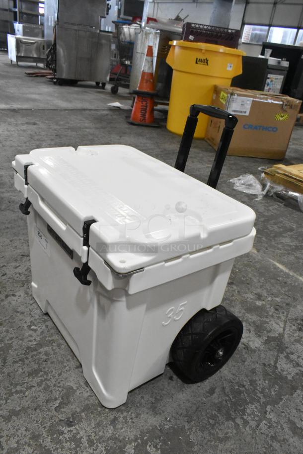 BRAND NEW SCRATCH AND DENT CaterGator CG35WHW white 35 Qt. rotomolded mobile cooler with large wheels and handle.