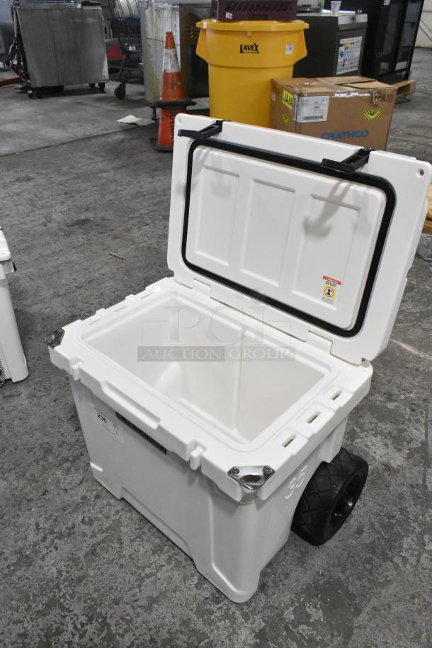 BRAND NEW CaterGator CG35WHW 35 Qt. white rotomolded cooler with wheels, minor scratches, open lid showing interior.