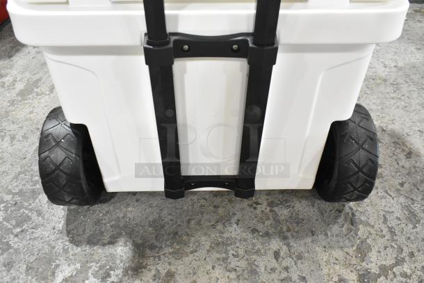 Brand new CaterGator CG35WHW 35 Qt. mobile rotomolded cooler, white, with large wheels and handle, scratch and dent condition.
