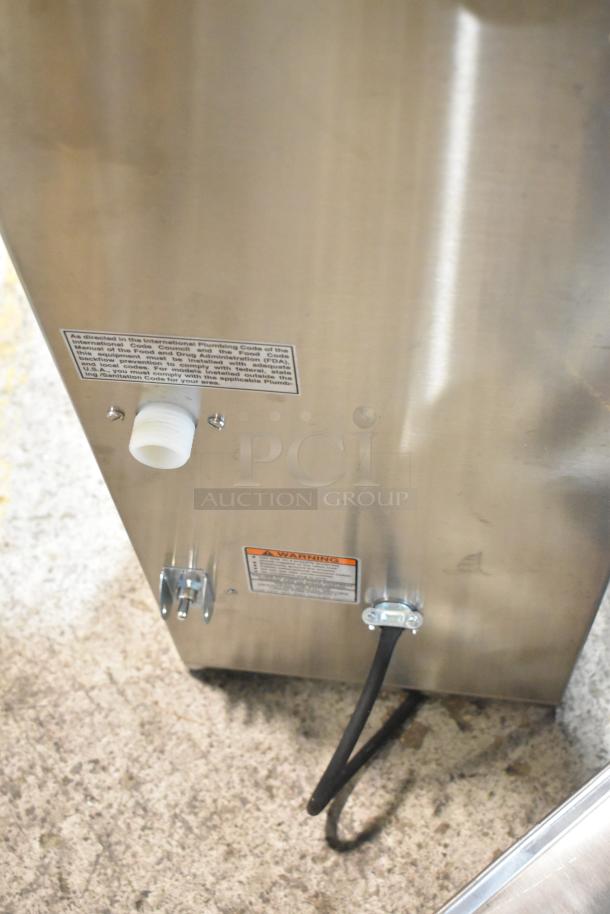 BRAND NEW 2025 Bunn ICB-DV BrewWISE stainless steel coffee brewer, 120V, with visible plumbing and warning labels.
