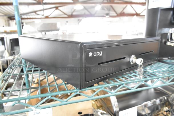 BRAND NEW APG Arlo 16x16" black cash drawer with key. Scratch and dent condition; drawer is stuck.
