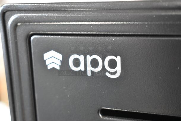 BRAND NEW SCRATCH AND DENT! APG Arlo EKDS320-1-B410-A20 16" x 16" black cash drawer with key, drawer stuck, visible APG logo.