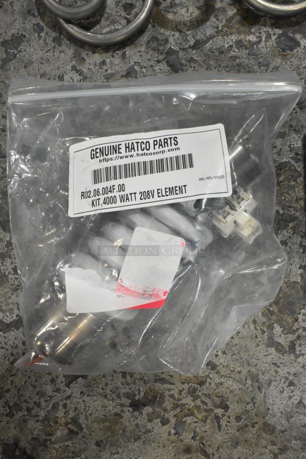 Bag of genuine Hatco parts, including Hatco R02.06.004F.00 4000W 208V element, new condition, labeled packaging.