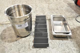 Stainless steel drop-in bins and metal holder, brand new, scratch and dent, visible sticker with auction tag "246."