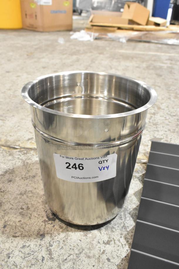 Brand new stainless steel drop-in bin with minor scratches and dents, labeled with auction details.