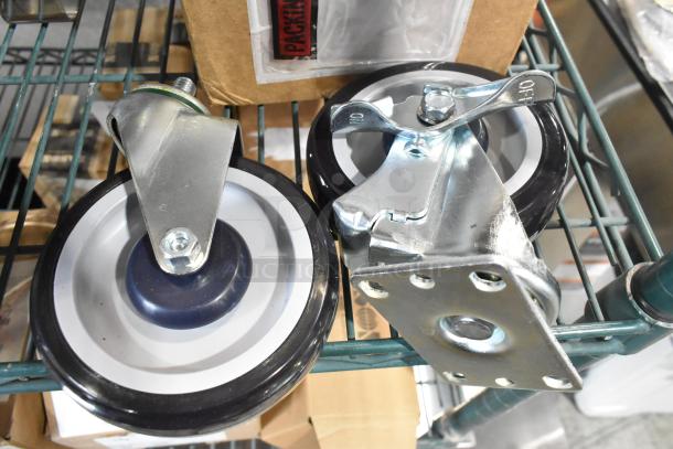 Lot of 2 brand new scratch and dent casters. One swivel caster with mounting plate, one fixed. Durable black and grey wheels.