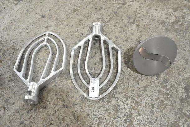 3 brand new scratch and dent items: 2 metal commercial paddle attachments for Hobart mixer, pelican head slicing blade.