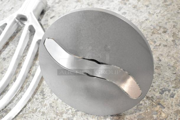 Brand new metal commercial paddle attachment and pelican head slicing blade for Hobart mixer. Scratch and dent condition.