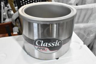 BRAND NEW APW Wyott RW-1V 7 Qt. Stainless Steel Round Warmer. Visible label, 120 Volts, 1 Phase. Scratch and dent condition.