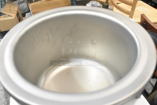 BRAND NEW APW Wyott RW-1V 7 Qt. Stainless Steel Round Warmer, 120V, 1 Phase, minor scratches visible.