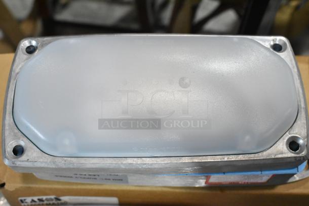 Kason® 11808FMA100 LED Fixture 120V 12W 4000K, brand new condition, flat design, visible mounting holes.