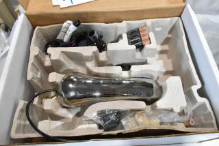 Brand new Bobrick B-8876 polished nickel automatic faucet with 6.5" cast spout, boxed with accessories. Scratch and dent condition.