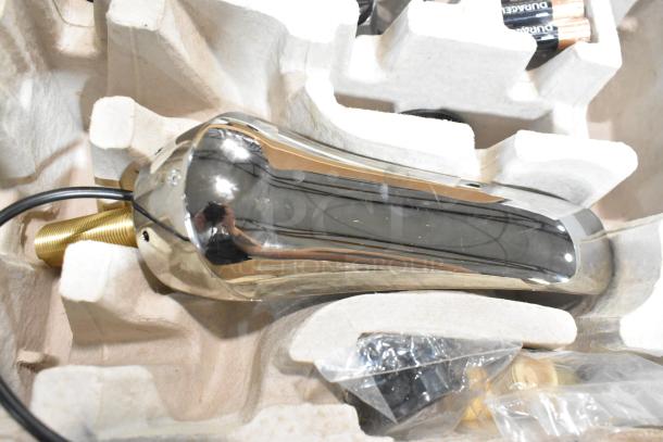 BRAND NEW Bobrick B-8876 polished nickel automatic faucet, 6.5" cast spout, minor scratches, packaged with cables and hardware.