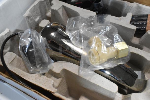 BRAND NEW Bobrick B-8876 polished nickel automatic faucet with 6 1/2" cast spout in original packaging. Minor scratches.
