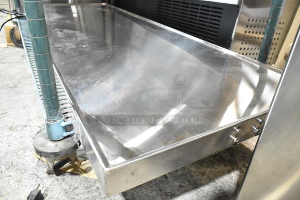 Brand new 2024 ServIt 423HSW2054 54" stainless steel heated shelf warmer, 120V, 1 Phase, visible minor scratches and dents.