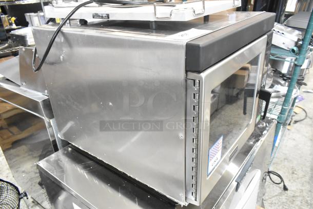 BRAND NEW Amana RC22S2 commercial microwave, stainless steel, scratch and dent condition, push button controls, 208/240V, 1 phase.