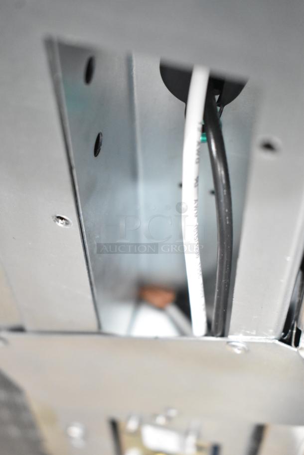 BRAND NEW 2025 Scotsman MC0330SA-1A stainless steel ice machine interior detail; wiring visible, 30" cube ice maker, 400 lb capacity.