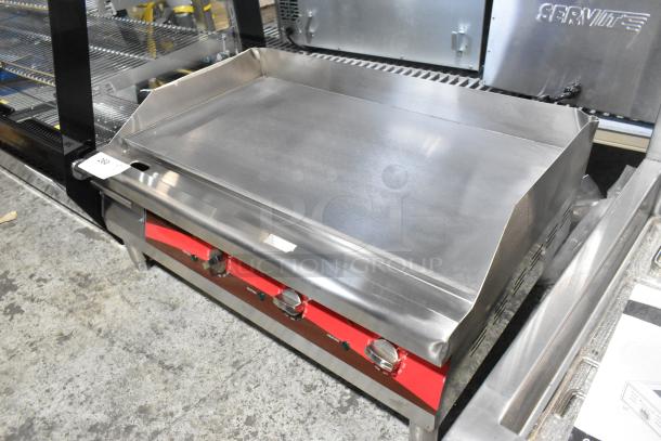 Brand new Avantco 177EG30N stainless steel 30" electric countertop griddle, 208/240V, 1 phase, with minor scratches.