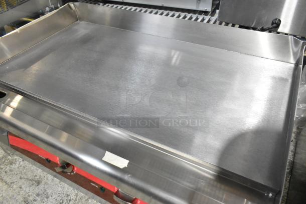 Brand new Avantco 177EG30N 30" stainless steel electric countertop griddle, visible scratches and dents, 208/240V, 1 phase.