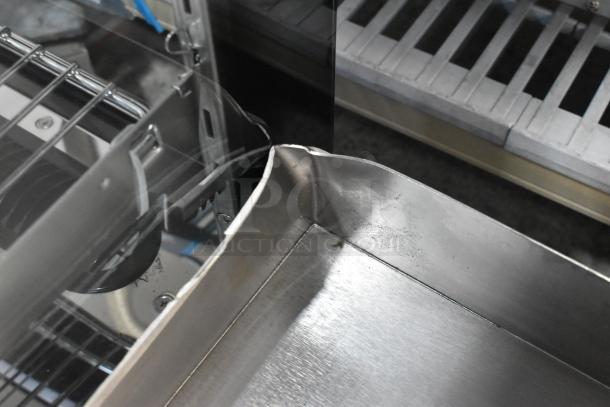 Avantco 177EG30N 30" electric countertop griddle with minor dent, stainless steel, 208/240V, 1 phase, new condition.