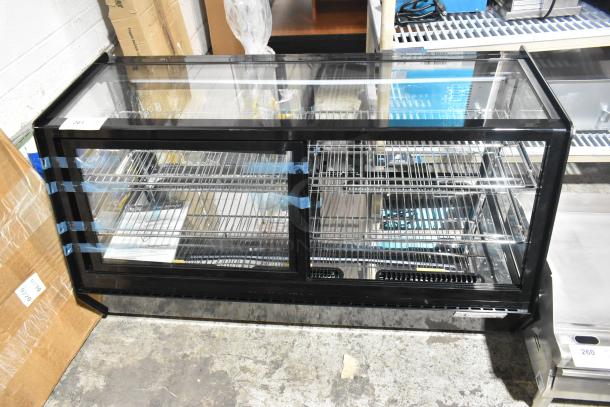 Avantco 360BCSS48HCB 48" black bakery display case with LED lighting. New, scratch and dent, broken glass visible. 120V.