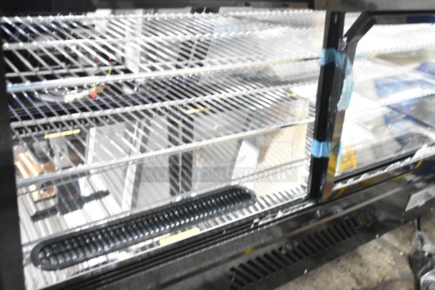 Avantco 360BCSS48HCB 48" black refrigerated bakery display case with LED lighting. New, with broken glass. 120V, 1 phase.