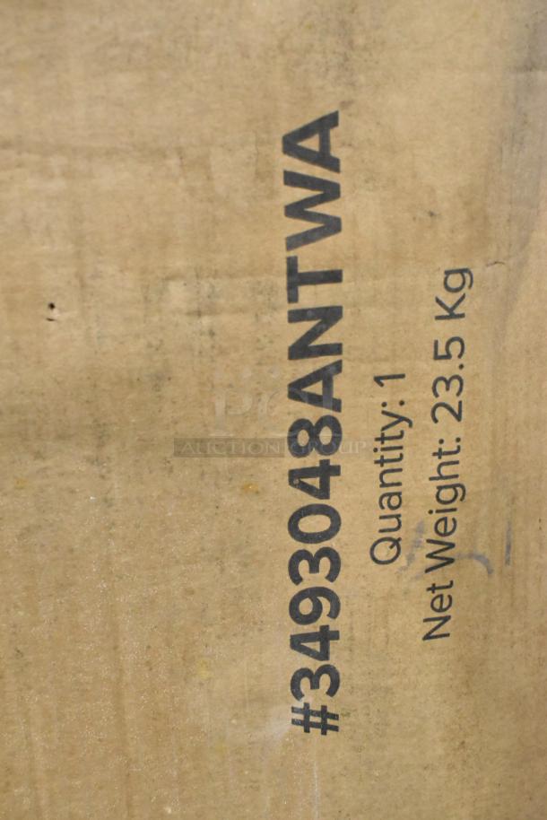 Brown cardboard box labeled "#3493048ANTWA" showing quantity 1 and net weight 23.5 kg.
