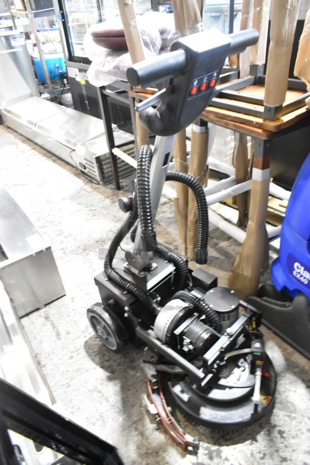 Brand new Lavex 274AFS3BAT 13" cordless floor scrubber, 3-gallon, walk-behind model, minor scratches, with scrub brush.