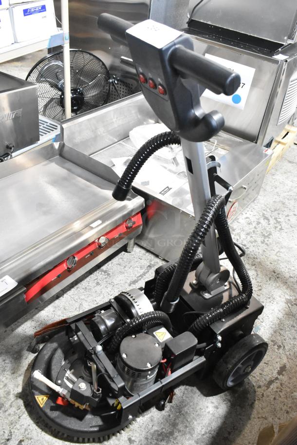 Brand new Lavex 274AFS3BAT 13" AGM cordless floor scrubber with scrub brush, 3-gallon capacity. Scratch and dent.