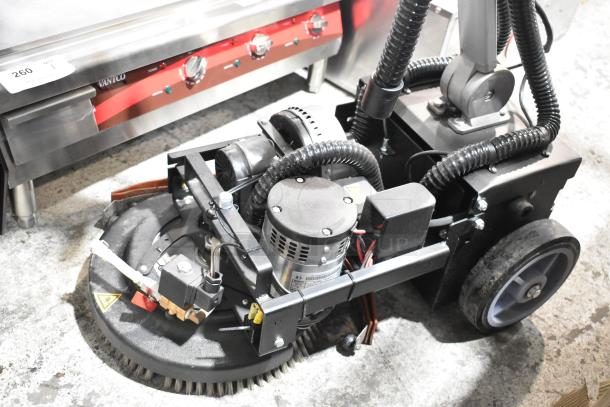 BRAND NEW Lavex 274AFS3BAT 13" AGM Cordless Floor Scrubber with brush, 3-gallon, minor scratches and dents visible.