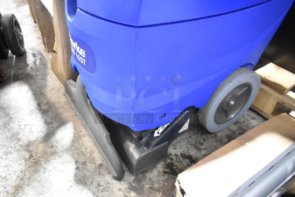 BRAND NEW Clarke EX40 16" Corded Carpet Extractor, 7 Gallon, visible label "56265504", minor scratches, blue body, wheels.