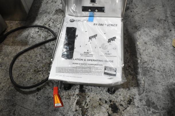 BRAND NEW 2024 Bunn SINGLE SH DBC Brewer with operating guide. Includes lower faucet, 120V, 1 Phase. Warning tag on hot water.