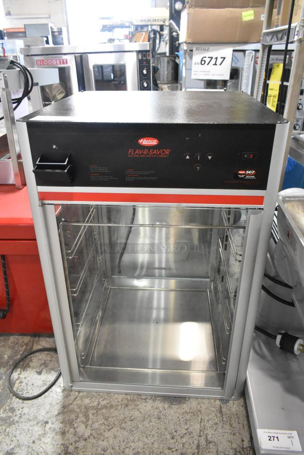Brand new Hatco FSDT-2X Flav-R-Savor tall two-door cabinet, four-tier pan rack, 120V, 1 phase, scratch and dent condition.