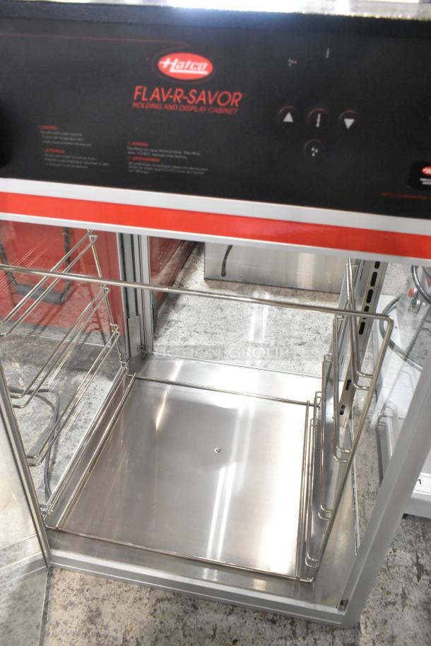 Brand new Hatco Flav-R-Savor FSDT-2X cabinet, two-door, four-tier pan rack, 120V, 1 Phase, minor scratches and dents.