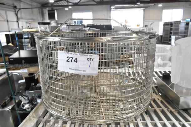 Brand new metal basket with minor scratches and dents, cylindrical shape, mesh design, and visible auction label with number 274.