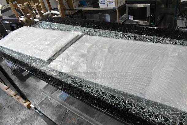 Brand new Avantco 193BCF60B bakery display case with broken top glass. Black, refrigerated, 59 1/8", 110-120V.