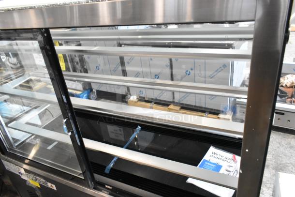 Brand new Avantco 193BCF60B black refrigerated bakery display case, 59 1/8" with broken top glass, 110-120 Volts, 1 Phase.