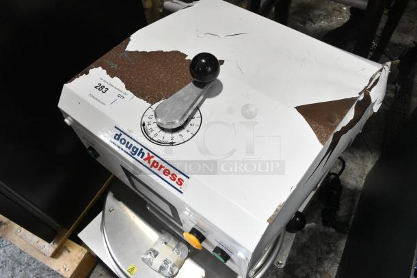 BRAND NEW Dough Xpress DXE-W 18" pizza dough press, metal body, automatic, heavy-duty, scratches and dents visible. Marked 120V.