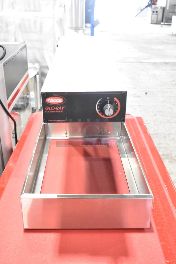 Brand new Hatco GRFF Glo-Ray 12 3/8" x 24" stainless steel French fry warmer, 120V, with control knob.