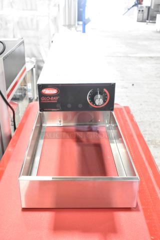 Brand new Hatco GRFF Glo-Ray 12 3/8" x 24" stainless steel French fry warmer, 120V, with control knob.