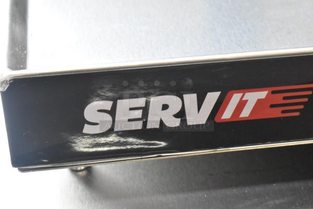 Brand new ServIt 423SW24TLCPA lighted strip warmer, scratch and dent, logo visible. 24", single toggle control, 120V.