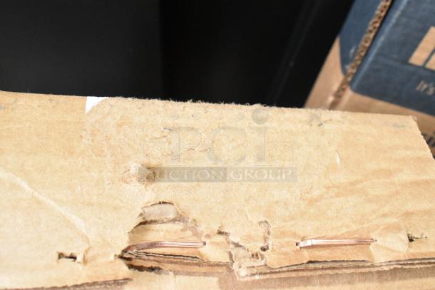 Damaged cardboard box containing new Kason® 401 Easimount Replacement Strip Curtains. Box shows tear and holes.