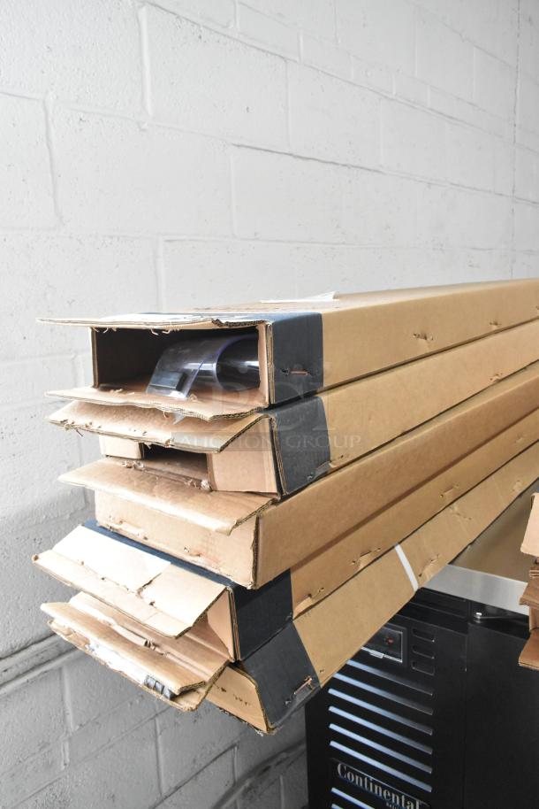 Five Kason® Easimount Strip Curtain Sets in cardboard boxes, varying sizes, new condition, showing minor exterior wear.