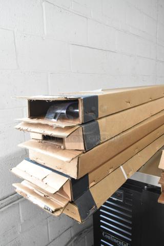 Five Kason® Easimount Strip Curtain Sets in cardboard boxes, varying sizes, new condition, showing minor exterior wear.