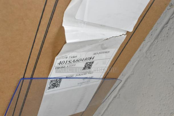 Shipping box for Kason® Easimount Strip Curtain Set with logistic label showing barcode and part number.
