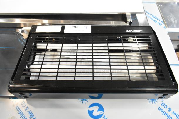 Brand new Lavex Zap N Trap V30E-2X15W black indoor insect light trap, includes 2 glue boards, 1,500 sq. ft. coverage, 120 volts.